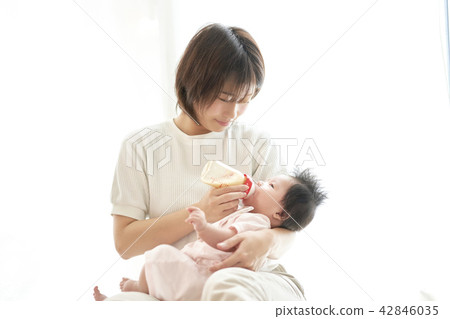 Baby milk family parent and child feeding 42846035