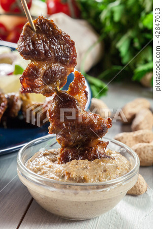 Traditional pork satay with peanut sauce 42847013