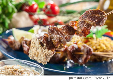 Traditional pork satay with peanut sauce Traditional pork satay with peanut sauce 42847016