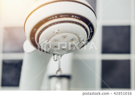 Water leak drop from old shower head 42851016