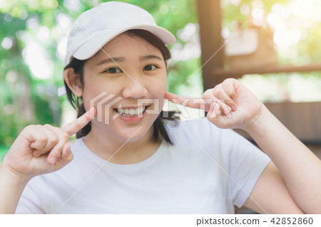 asian cute teen good dental health smiling cheeks 42852860