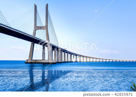 Vasco da Gama bridge extending above the Tagus River 42855971