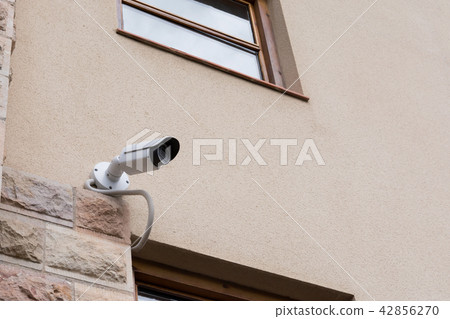 security CCTV camera on the concrete wall security CCTV camera on the concrete wall 42856270