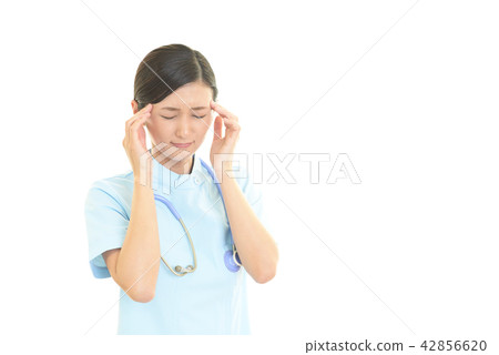 Nurse complaining of headache Nurse complaining of headache 42856620