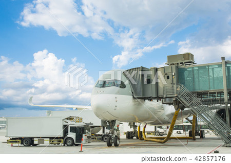 Loading cargo on plane in airport. cargo plane  42857176