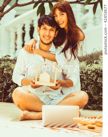 Young couple planning to buy a house concept. 42858677