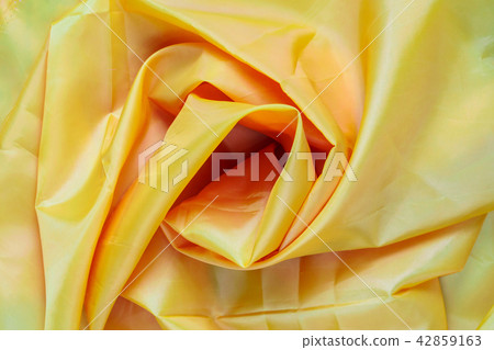 Yellow Synthetic Fabric Background Yellow Synthetic Fabric Background 42859163