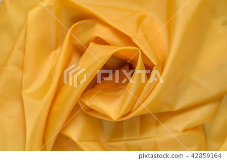 Yellow Synthetic Fabric Background Yellow Synthetic Fabric Background 42859164
