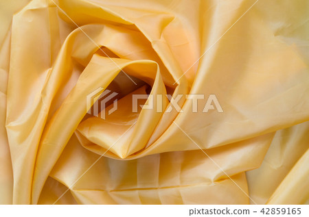 Yellow Synthetic Fabric Background Yellow Synthetic Fabric Background 42859165