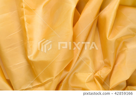 Yellow Synthetic Fabric Background Yellow Synthetic Fabric Background 42859166