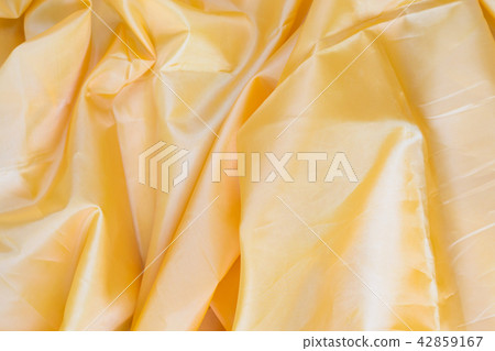 Yellow Synthetic Fabric Background Yellow Synthetic Fabric Background 42859167