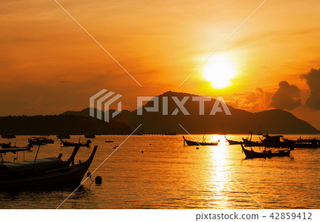 fishing boat in the sea in morning time fishing boat in the sea in morning time 42859412