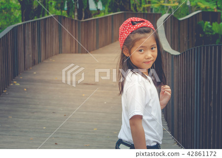 Portrait Asian children in public park. 42861172