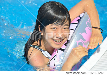 Girls laughing at the pool Girls laughing at the pool 42861265
