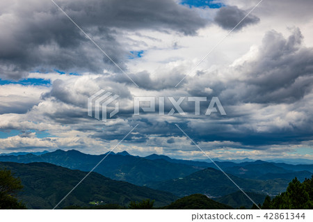 Summer mountain weather Clouds after the typhoon and Chichibu mountain view b - 2 From Higashi Chichi village to Mineyama · Hoedo Mountain direction 42861344