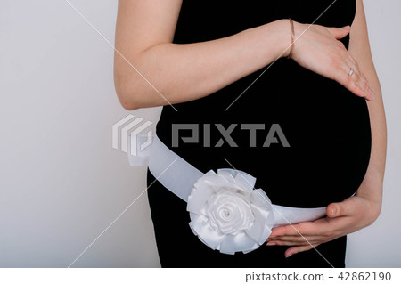 Pregnant woman on white background Pregnant woman on white background 42862190