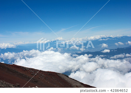 The sea of clouds seen from the top of Mt. Fuji The sea of clouds seen from the top of Mt. Fuji 42864652
