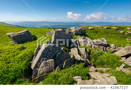 range of stones on the grassy hill range of stones on the grassy hill 42867537