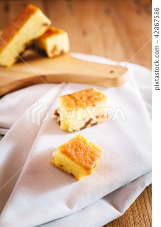 Dried Longan Cake on wooden table. Dried Longan Cake on wooden table. 42867586