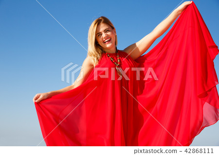 Woman in red 42868111