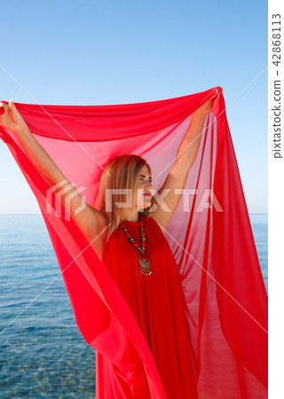 Woman in red 42868113