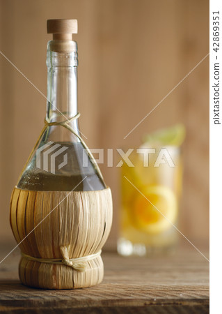 homemade Vodka and glass witn orange juice 42869351