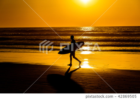 At dusk · Silhouette of surfing beach At dusk · Silhouette of surfing beach 42869505
