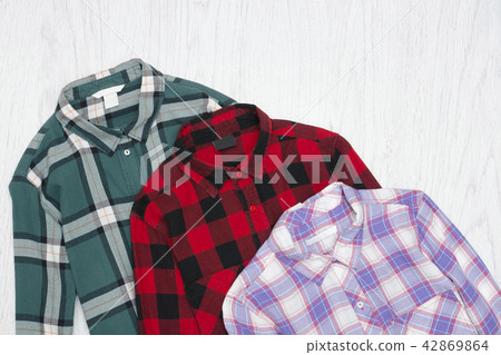 Green, red and lavender plaid shirts Green, red and lavender plaid shirts 42869864