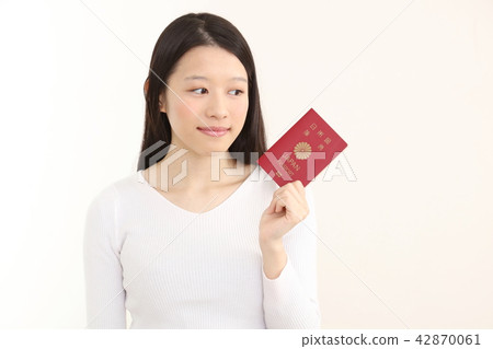 A woman with a passport A woman with a passport 42870061