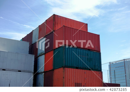Stacked maritime containers Stacked maritime containers 42873285