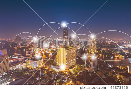 Aerial view of digital technology over cityscape. 42873526