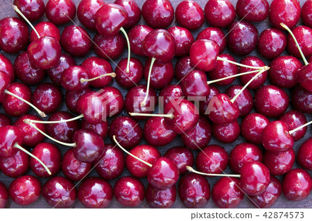 Fresh sweet cherries bowl 42874573