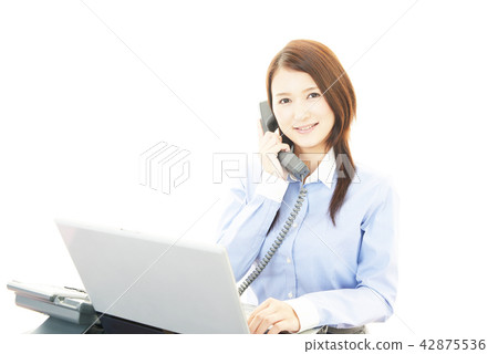 Business woman with handset Business woman with handset 42875536