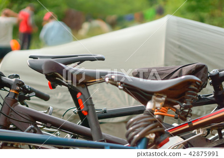 tents and bicycles at the campsite in summer 42875991