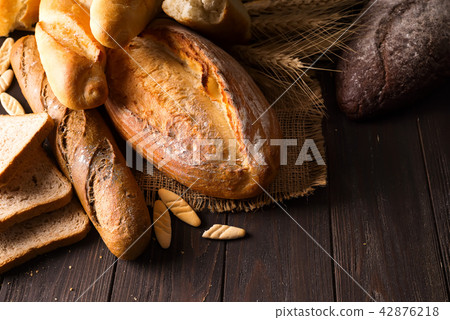 Top view of different kinds of bread with cereals isolated 42876218