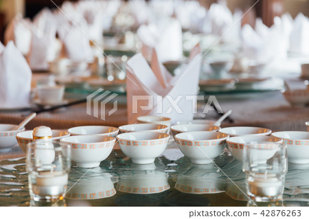 chinese table set for catering in restaurant 42876263