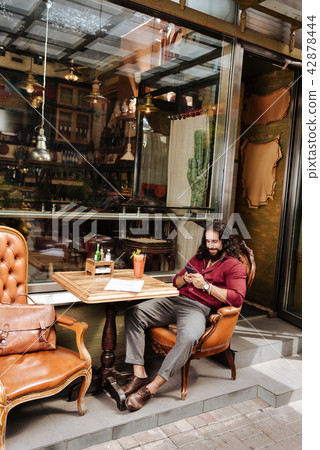 Nice brunette man resting 42878444