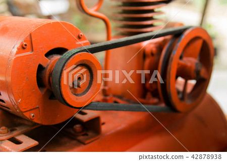 close up pulley and belt drive. machine composed close up pulley and belt drive. machine composed 42878938