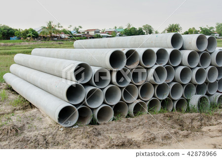 stacked of concrete, cement pipes. concrete pipes 42878966