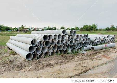 stacked of concrete, cement pipes. concrete pipes 42878967