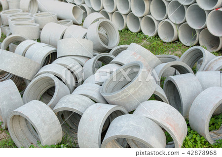 stacked of concrete, cement pipes. concrete pipes 42878968