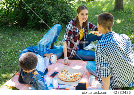 Beautiful smiling young woman looking at her boyfriend 42883426