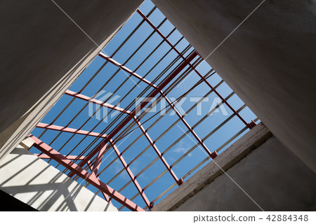 Structural steel beam on roof of building. Structural steel beam on roof of building. 42884348