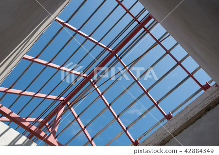 Structural steel beam on roof of building. Structural steel beam on roof of building. 42884349