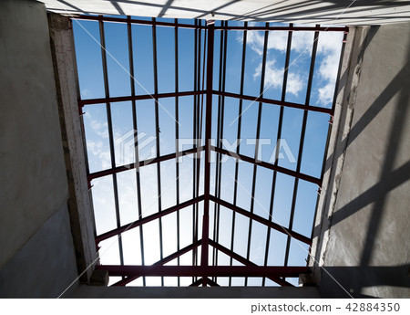 Structural steel beam on roof of building. Structural steel beam on roof of building. 42884350
