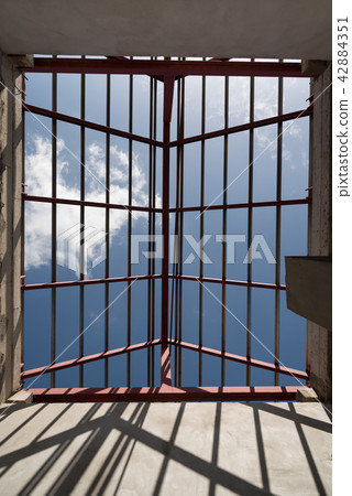 Structural steel beam on roof of building. Structural steel beam on roof of building. 42884351