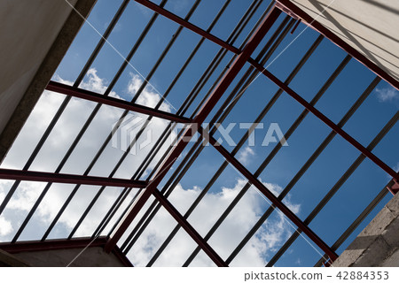Structural steel beam on roof of building. Structural steel beam on roof of building. 42884353