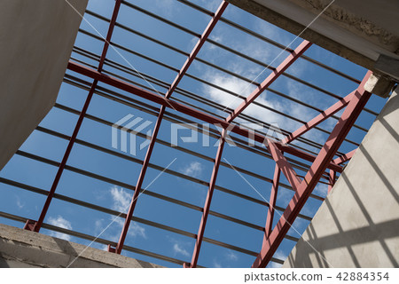 Structural steel beam on roof of building. Structural steel beam on roof of building. 42884354