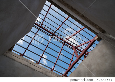 Structural steel beam on roof of building. Structural steel beam on roof of building. 42884355