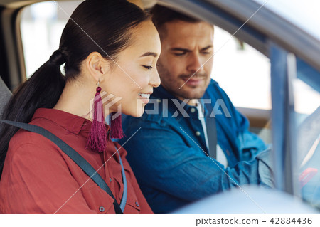 Delighted cheerful woman smiling Delighted cheerful woman smiling 42884436